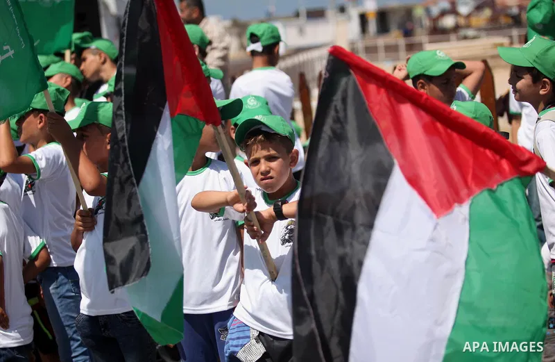Palestinian children take part in a summer camp organized by Hamas movement in Gaza city on July 10, 2016. Hamas movement organized dozens of summer camps for Palestinian children during the period of school holidays. Ph...