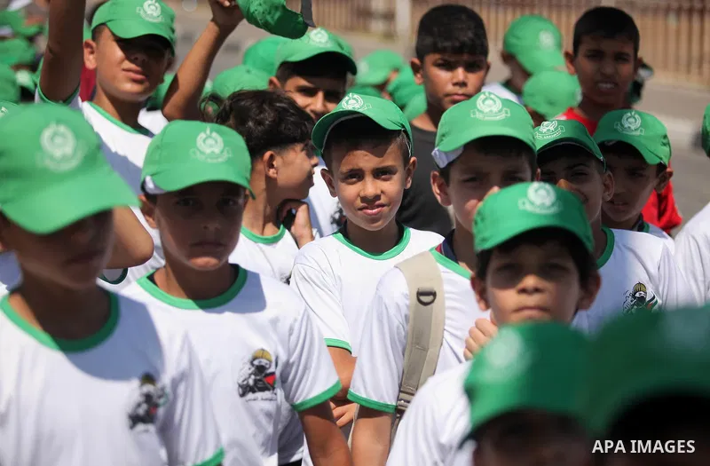 Palestinian children take part in a summer camp organized by Hamas movement in Gaza city on July 10, 2016. Hamas movement organized dozens of summer camps for Palestinian children during the period of school holidays. Ph...