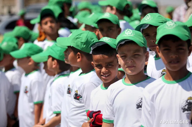 Palestinian children take part in a summer camp organized by Hamas movement in Gaza city on July 10, 2016. Hamas movement organized dozens of summer camps for Palestinian children during the period of school holidays. Ph...