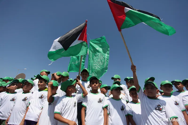 Palestinian children take part in a summer camp organized by Hamas movement in Gaza city on July 10, 2016. Hamas movement organized dozens of summer camps for Palestinian children during the period of school holidays. Ph...