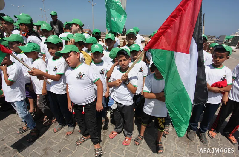 Palestinian children take part in a summer camp organized by Hamas movement in Gaza city on July 10, 2016. Hamas movement organized dozens of summer camps for Palestinian children during the period of school holidays. Ph...