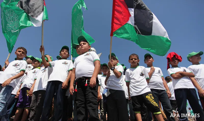 Palestinian children take part in a summer camp organized by Hamas movement in Gaza city on July 10, 2016. Hamas movement organized dozens of summer camps for Palestinian children during the period of school holidays. Ph...