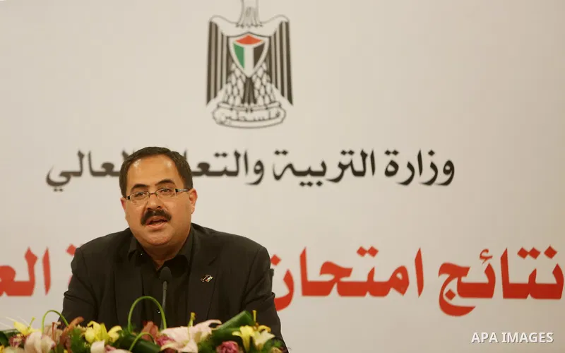 Palestinian Minister of Education, Sabri Saidam, speaks during a press conference to announce the results of the final high school exams known as "Tawjihi", in the West Bank city of Ramallah on July 11, 2016. Photo by Sh...