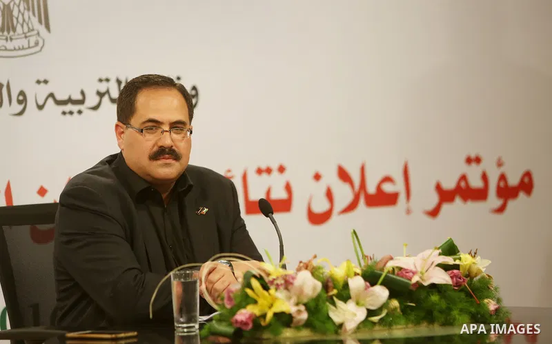 Palestinian Minister of Education, Sabri Saidam, speaks during a press conference to announce the results of the final high school exams known as "Tawjihi", in the West Bank city of Ramallah on July 11, 2016. Photo by Sh...