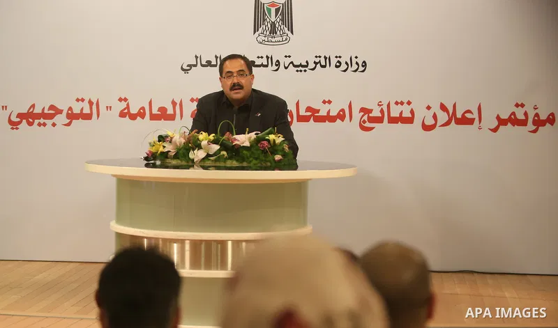 Palestinian Minister of Education, Sabri Saidam, speaks during a press conference to announce the results of the final high school exams known as "Tawjihi", in the West Bank city of Ramallah on July 11, 2016. Photo by Sh...