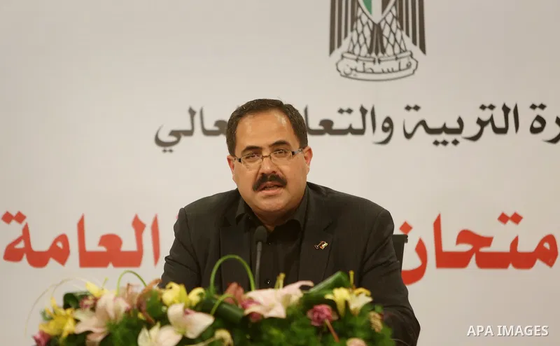 Palestinian Minister of Education, Sabri Saidam, speaks during a press conference to announce the results of the final high school exams known as "Tawjihi", in the West Bank city of Ramallah on July 11, 2016. Photo by Sh...