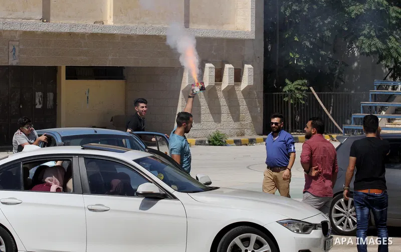 Palestinian high school students celebrate after heard their results of final exams known as "Tawjihi", in the West Bank city of Nablus on July 11, 2016. Photo by Nedal Eshtayah