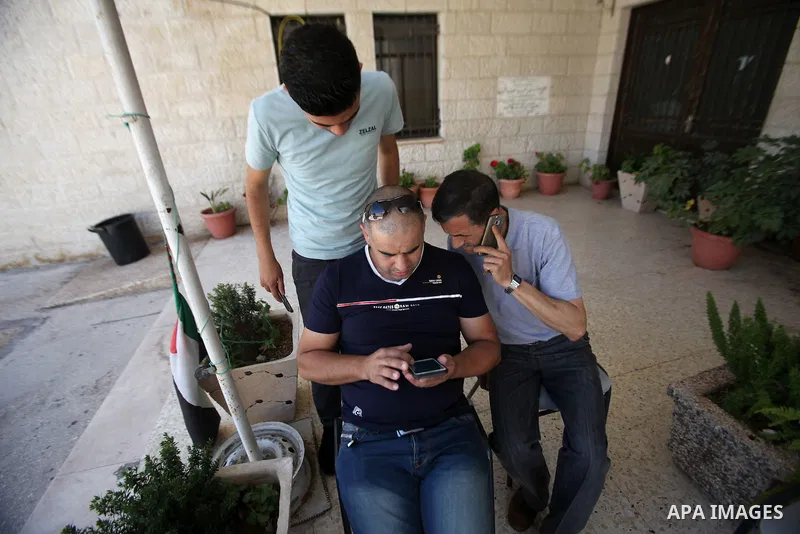 Palestinian high school students celebrate after heard their results of final exams known as "Tawjihi", in the West Bank city of Nablus on July 11, 2016. Photo by Nedal Eshtayah