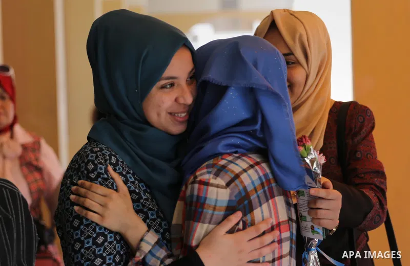 Palestinian high school students celebrate after heard their results of final exams known as "Tawjihi" in Gaza city on July 11, 2016. Photo by Mohammed Asad