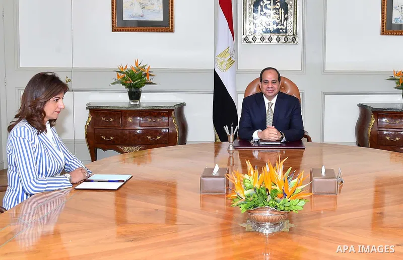 Egyptian President Abdel Fattah al-Sisi meets with the minister of immigration and Expatriates Nabila Makram, in Cairo, Egypt, on July 11, 2016. Photo by Egyptian President Office