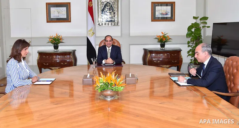 Egyptian President Abdel Fattah al-Sisi meets with the minister of immigration and Expatriates Nabila Makram, in Cairo, Egypt, on July 11, 2016. Photo by Egyptian President Office