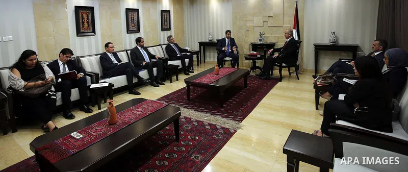 Palestinian Prime Minister Rami Hamdallah meets with A delegation of the Greek Parliament, in the West Bank city of Ramallah on July 11, 2016. Photo by Prime Minister Office