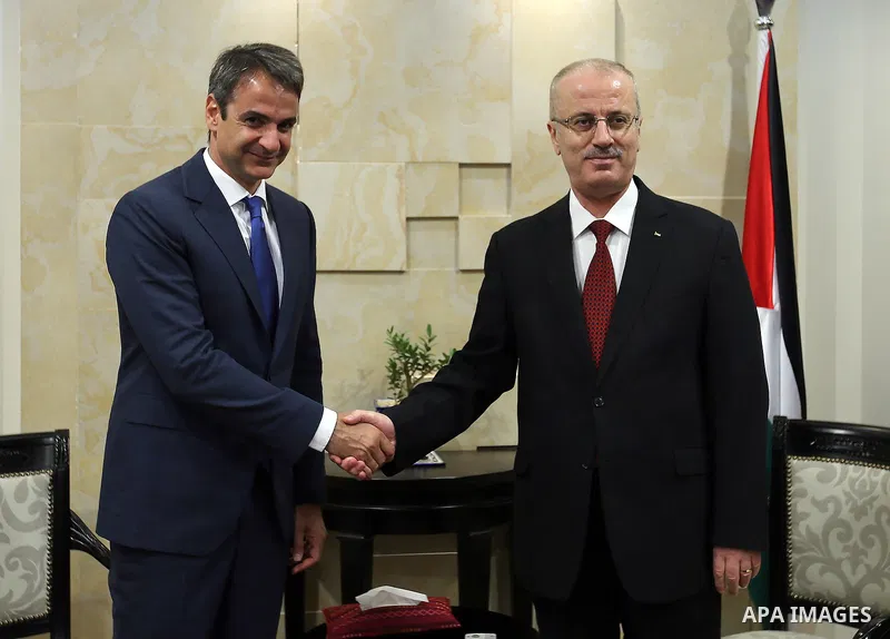Palestinian Prime Minister Rami Hamdallah meets with A delegation of the Greek Parliament, in the West Bank city of Ramallah on July 11, 2016. Photo by Prime Minister Office