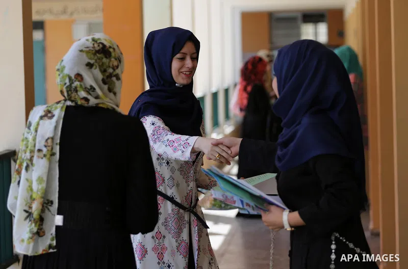 Palestinian high school students celebrate after heard their results of final exams known as "Tawjihi" in Gaza city on July 12, 2016. Photo by Mohammed Asad
