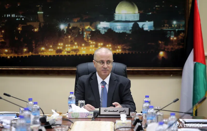 Palestinian Prime Minister, Rami Hamdallah, chairs a meeting of the Council of Ministers, in the West Bank city of Ramallah, on July 12, 2016. Photo by Prime Minister Office