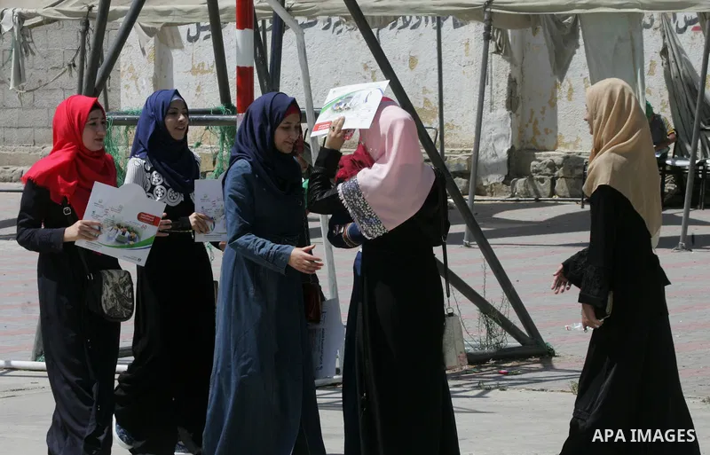 Palestinian high school students look for their results of final high school exams, known as "Tawjihi" in Rafah in the southern Gaza strip on July 12, 2016. Photo by Abed Rahim Khatib