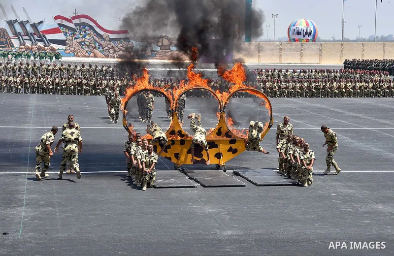 Egyptian forces demonstrate their skills during a military academy graduation ceremony in the capital, Cairo, on July 12, 2016. Photo by Egyptian President Office