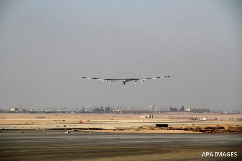 Solar Impulse 2, the solar powered plane, lands at Cairo International Airport on July 13, 2016, for the penultimate stage of its world tour. The experimental plane had completed the first solo transatlantic flight power...
