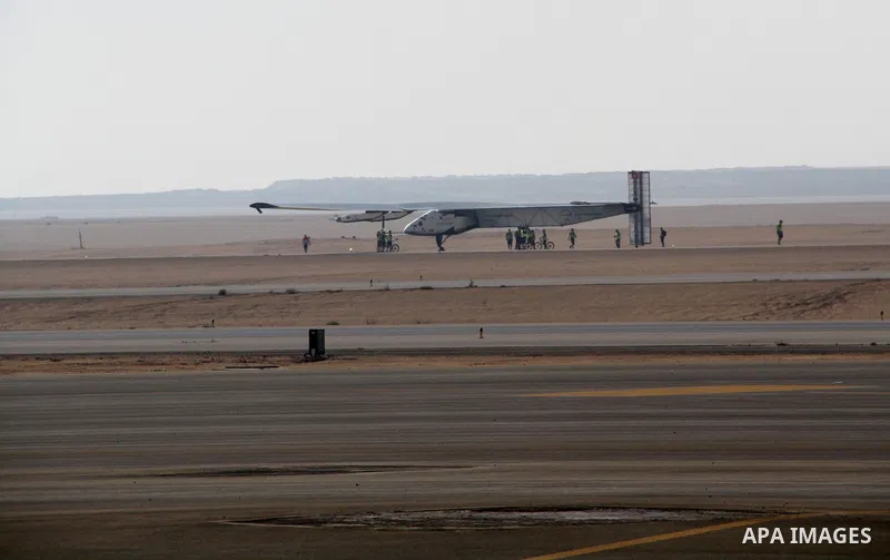 Solar Impulse 2, the solar powered plane, lands at Cairo International Airport on July 13, 2016, for the penultimate stage of its world tour. The experimental plane had completed the first solo transatlantic flight power...