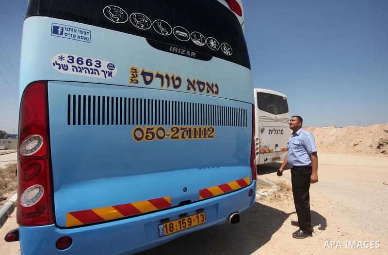 Palestinians check vehicles upon arrival at Erez crossing between Israel and northern Gaza Strip July 13, 2016. Israel opened a second crossing with Gaza on Wednesday to allow the entry ofvehicles for the first time sinc...