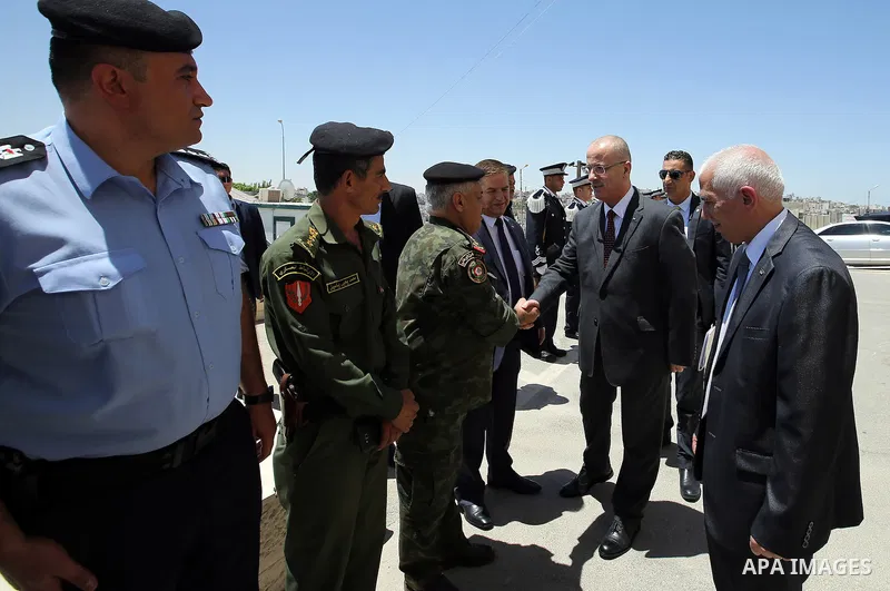 Palestinian Prime Minister, Rami Hamdallah, chairs a security meeting, in the West Bank city of Hebron, on July 13, 2016. Photo by Prime Minister Office