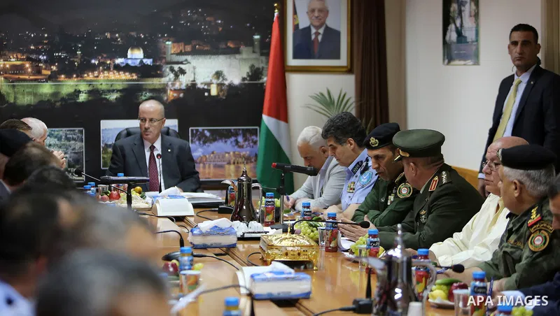 Palestinian Prime Minister, Rami Hamdallah, chairs a security meeting, in the West Bank city of Hebron, on July 13, 2016. Photo by Prime Minister Office