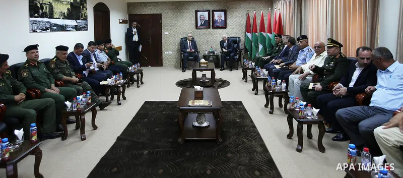 Palestinian Prime Minister, Rami Hamdallah, chairs a security meeting, in the West Bank city of Hebron, on July 13, 2016. Photo by Prime Minister Office