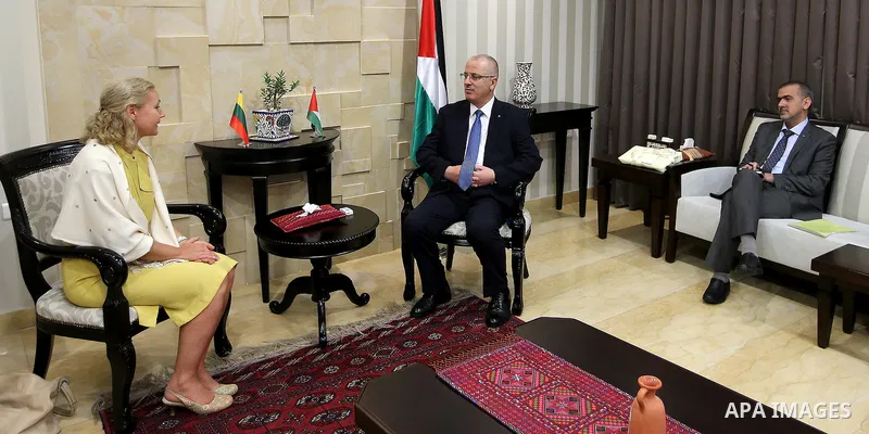 Palestinian Prime Minister Rami Hamdallah meets with representative for the Lithuanian to the Palestinian Authority Nida Dalmantata, in the West Bank city of Ramallah, on July 14, 2016. Photo by Prime Minister Office