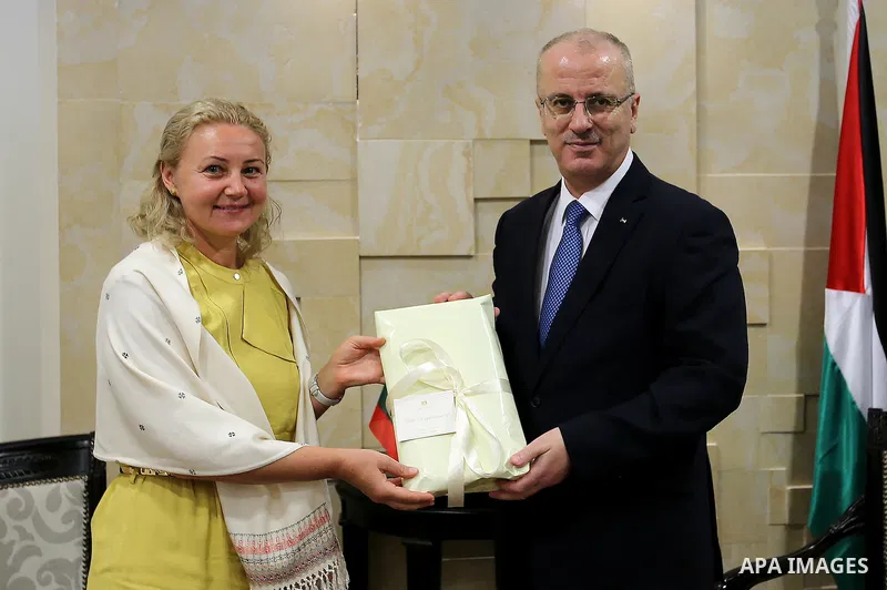 Palestinian Prime Minister Rami Hamdallah meets with representative for the Lithuanian to the Palestinian Authority Nida Dalmantata, in the West Bank city of Ramallah, on July 14, 2016. Photo by Prime Minister Office