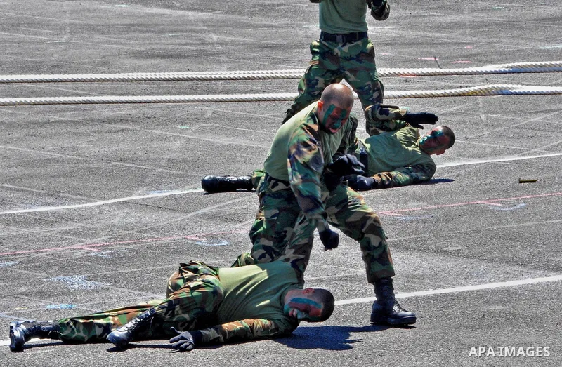 Egyptian Navy forces demonstrate their skills during a military academy graduation ceremon in Cairo, Egypt July 14, 2016. Photo by Egyptian President Office