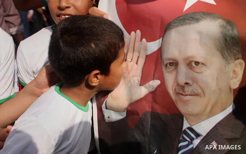 Palestinians hold banners during a protest against military coup attempt in Turkey, in Khan Younis in the southern Gaza strip, on July 16, 2016. President Recep Tayyip Erdogan battled to regain control over Turkey on Jul...