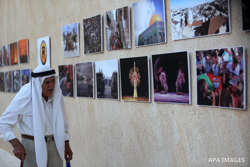 Palestinians participate in a photo gallery Within the activities of Heritage week in the village of Bir Zeit, in the West Bank near Ramallah on july 16, 2016. . Photo by Shadi Hatem