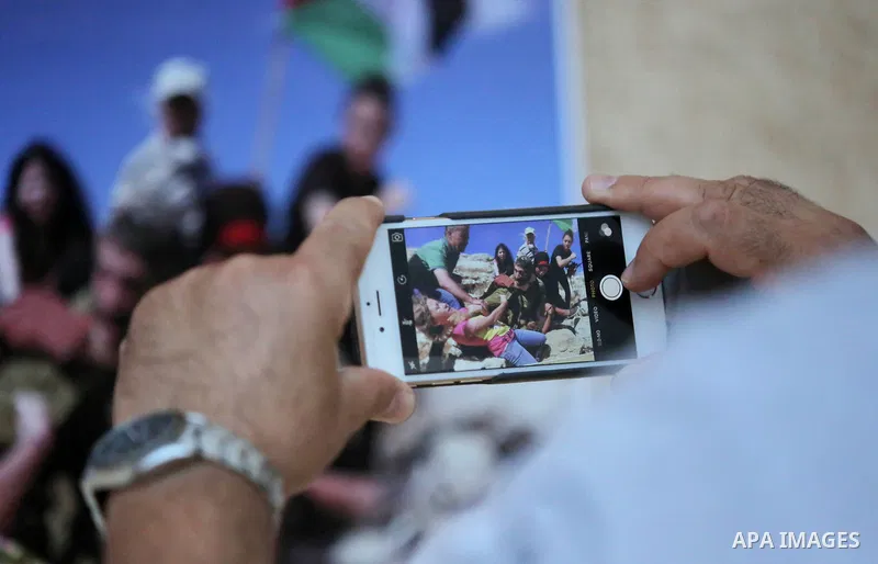 Palestinians participate in a photo gallery Within the activities of Heritage week in the village of Bir Zeit, in the West Bank near Ramallah on july 16, 2016. . Photo by Shadi Hatem