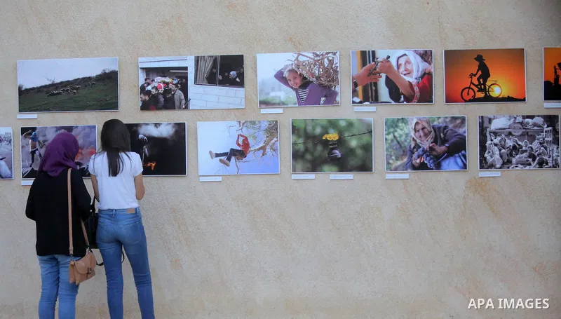Palestinians participate in a photo gallery Within the activities of Heritage week in the village of Bir Zeit, in the West Bank near Ramallah on july 16, 2016. . Photo by Shadi Hatem