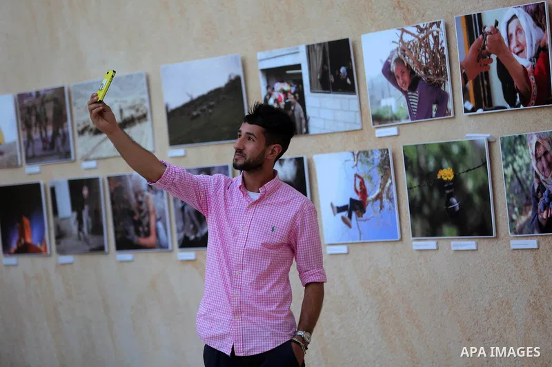 Palestinians participate in a photo gallery Within the activities of Heritage week in the village of Bir Zeit, in the West Bank near Ramallah on july 16, 2016. . Photo by Shadi Hatem