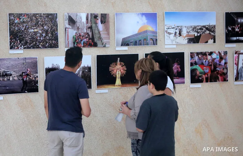 Palestinians participate in a photo gallery Within the activities of Heritage week in the village of Bir Zeit, in the West Bank near Ramallah on july 16, 2016. . Photo by Shadi Hatem