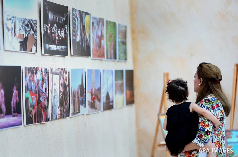 Palestinians participate in a photo gallery Within the activities of Heritage week in the village of Bir Zeit, in the West Bank near Ramallah on july 16, 2016. . Photo by Shadi Hatem