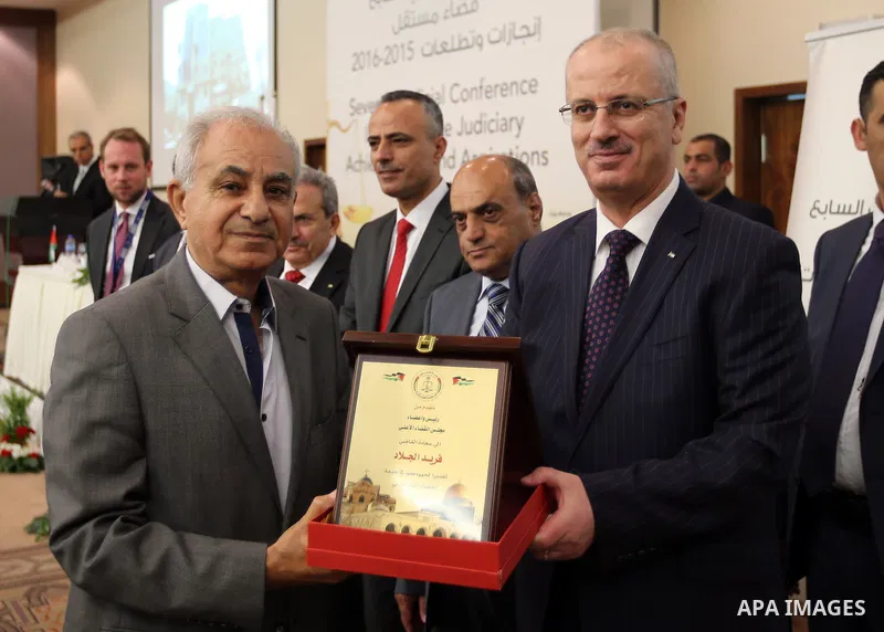 Palestinian Prime Minister Rami Hamdallah delivers a speech during the opening of the Seventh Judicial Conference, in the West Bank city of Ramallah july 17, 2016. Photo by Prime Minister Office
