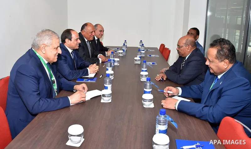 Egyptian President Abdel Fattah al-Sisi meets with Sudanese President Omar al-Bashir, in in Kigali, Rwanda, on July 17, 2016. Photo by Egyptian President Office