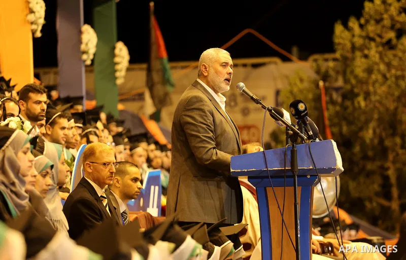 Senior Hamas leader Ismail Haniyeh speaks during graduation ceremony at the University College of Applied Sciences in Gaza city on July 17, 2016. Photo by Mohammed Asad