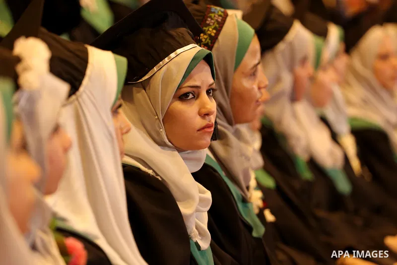 Palestinian students participate in their graduation ceremony at the University College of Applied Sciences in Gaza city on July 17, 2016. Photo by Mohammed Asad