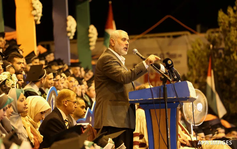 Senior Hamas leader Ismail Haniyeh speaks during graduation ceremony at the University College of Applied Sciences in Gaza city on July 17, 2016. Photo by Mohammed Asad