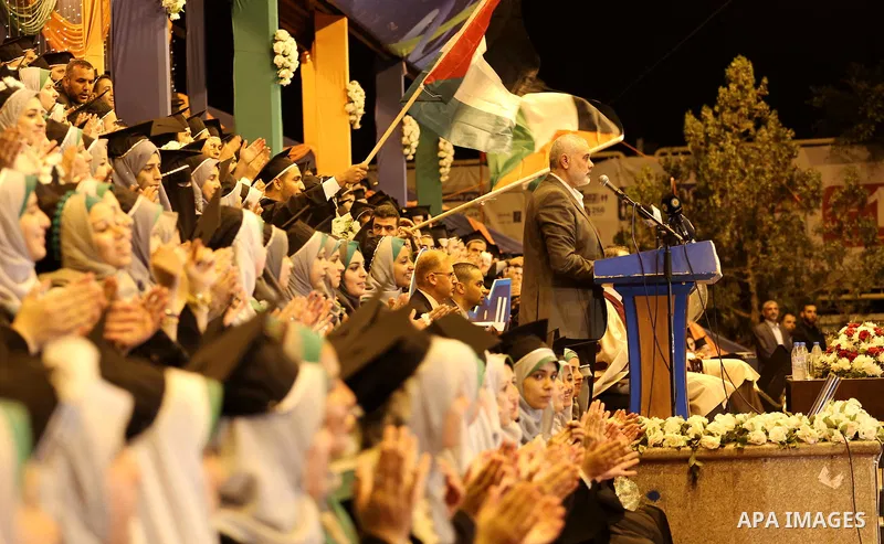 Senior Hamas leader Ismail Haniyeh speaks during graduation ceremony at the University College of Applied Sciences in Gaza city on July 17, 2016. Photo by Mohammed Asad