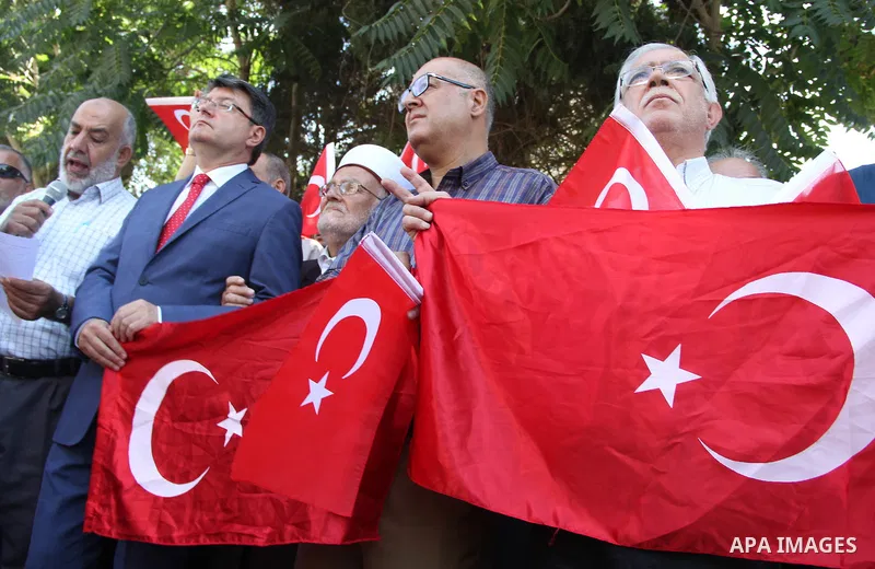 Turkish Consul, Mustafa Sarnic, take part in a protest against the military coup attempt in Turkey, in front of the Turkish consulate in east Jerusalem on July 18, 2016. Photo by Mahfouz Abu Turk