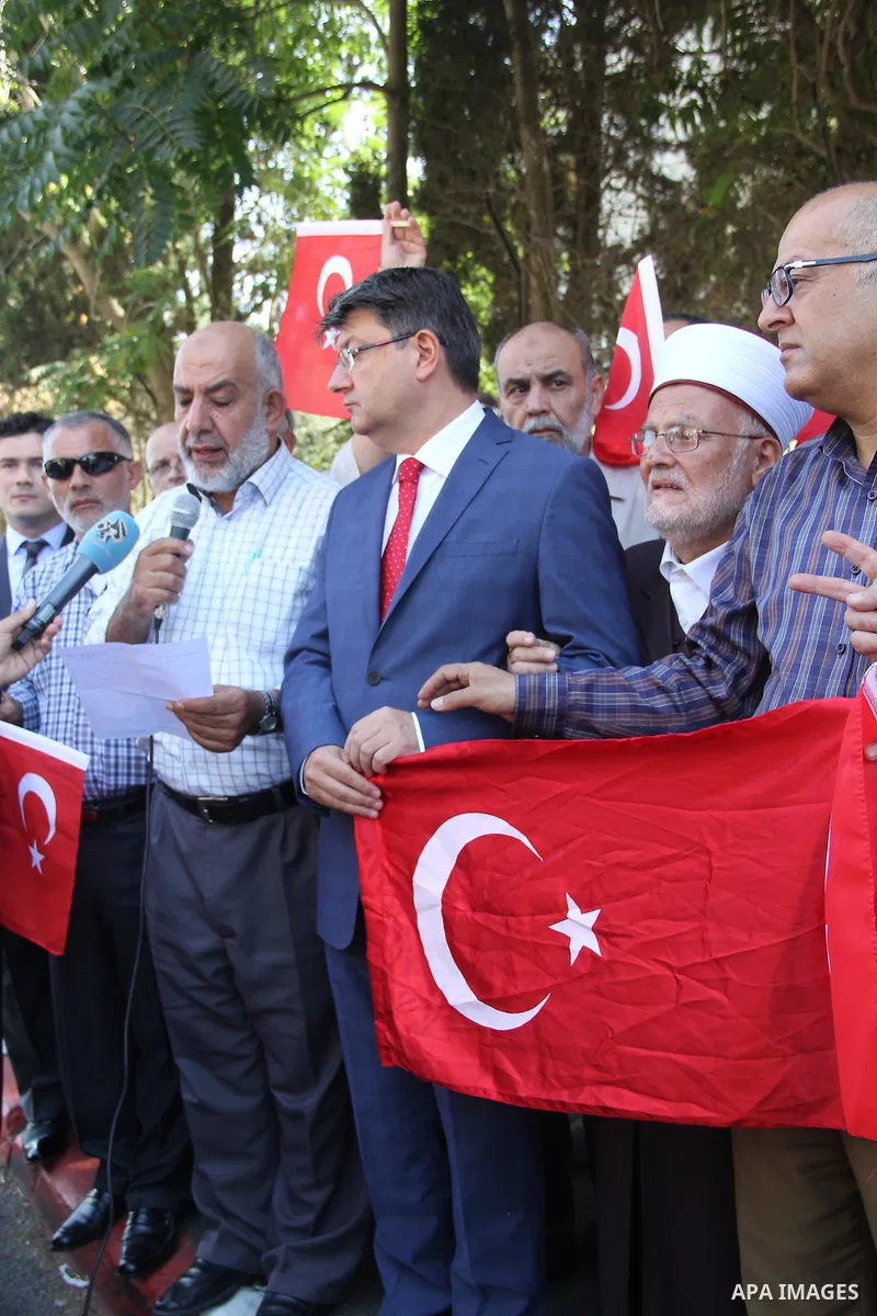 Turkish Consul, Mustafa Sarnic, take part in a protest against the military coup attempt in Turkey, in front of the Turkish consulate in east Jerusalem on July 18, 2016. Photo by Mahfouz Abu Turk