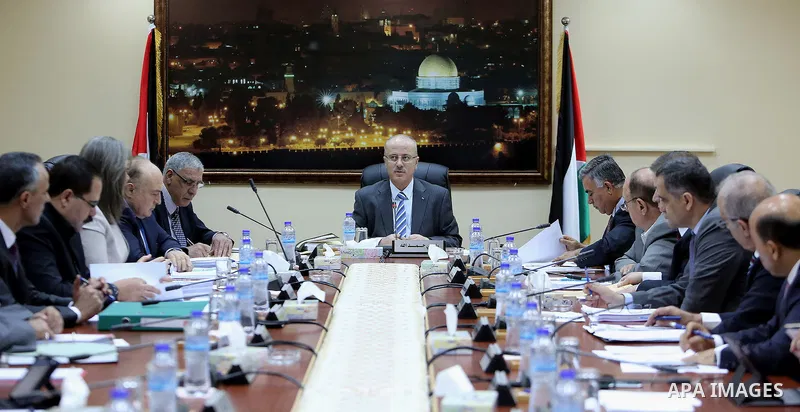 Palestinian Prime Minister, Rami Hamdallah, chairs a meeting of the Council of Ministers, in the West Bank city of Ramallah, on July 19, 2016. Photo by Prime Minister Office