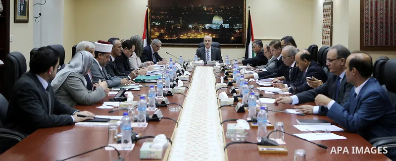 Palestinian Prime Minister, Rami Hamdallah, chairs a meeting of the Council of Ministers, in the West Bank city of Ramallah, on July 19, 2016. Photo by Prime Minister Office