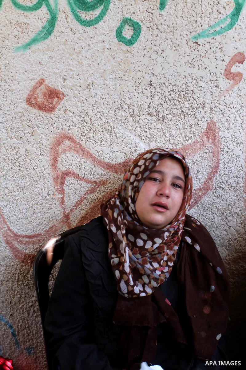 Palestinian relatives and friends mourn during the funeral of Salah al-Astal, a member of the Islamic Jihad's armed wing -the Al-Quds Brigades- who died after a tunnel collapse in the Gaza Strip, on July 19, 2016 in Khan...