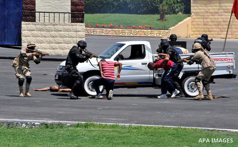 Egyptian police officers demonstrate their skills during at the police academy in Cairo, Egypt July 19, 2016. Photo by Egyptian President Office