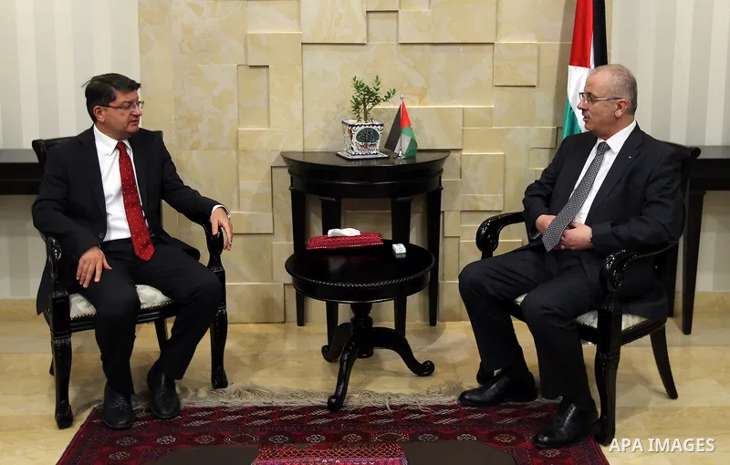 Palestinian Prime Minister, Rami Hamadallah, meets with Turkish Consul Mustafa Sarnbj, in the West Bank city of Ramallah, on July 21, 2016. Photo by Prime Minister Office